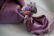 Garden design:I love doing weddings and adore this color Purple. In fact I would duo this with a black satin as the color theme. Maybe to bold for you, but not for me. I like over the top kind of extravagant wedding designs! Garden design:Purple Dinner Napkin @ Wedding Reception