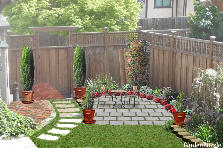 Garden design:Corner with Conifers