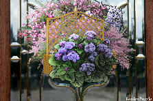 Garden design: Garden design:Spring Floss Flower Door Wreath